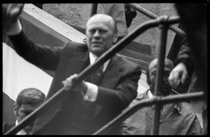 Gerald Ford at the dedication of the Old Great Falls Historic District as a national historic landmark, walking up a ramp and waving to the crowd