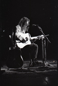 Neil Young performing at the Music Hall