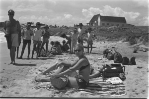 U.S. secretaries vacationing on the beach at Phu Quoc. Rest of the film shows various scenes at Duong Dong.