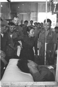 Wounded North Vietnamese doctor receives treatment at Can Giuoc infirmary.