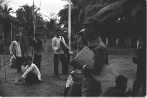 Captain Le Quang Chinh addresses farmers who are going to build fences for defense; Luong Hoa Village.