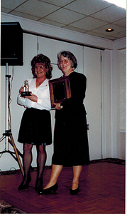 Phyllis Frye and Unidentified Woman with Awards