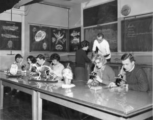 Suffolk University instructor Russell Howland conducting a Biology laboratory class