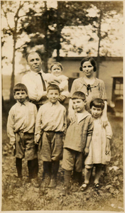 My mother, the baby, and her family in 1923