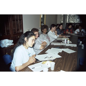 Clara Garcia and other staffers at Inquilinos Boricuas en Acción staff meeting.