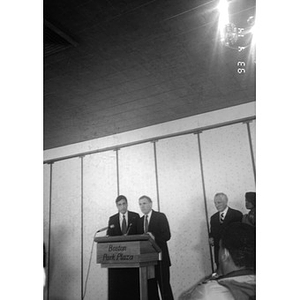 Henry Cisneros, HUD Secretary, and Mayor Flynn at the podium.
