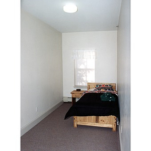 Small bedroom in a Villa Victoria apartment.