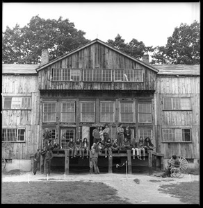 Commune members at the entrance to the Brotherhood of the Spirit dormitory in Warwick, Mass.