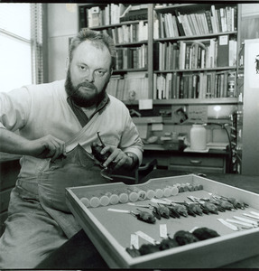 David J. Klingener at work with bat specimens