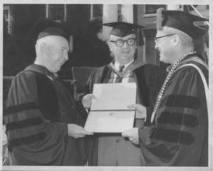 Richard C. Foley, John W. Lederle and Oswald Tippo with award