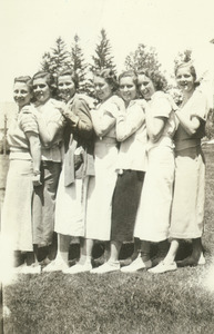 Class of 1936 women pose outdoors