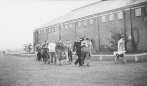 Football fans heading to a campus game