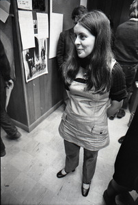 Bernadette Devlin McAliskey standing in the WBCN office