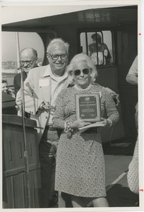 Harold Russell presenting a special commondation to Margaret Milbank Bogert