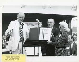 Mayor Edward Koch, Mr. Milbank, and Mrs. Bogert presenting an award