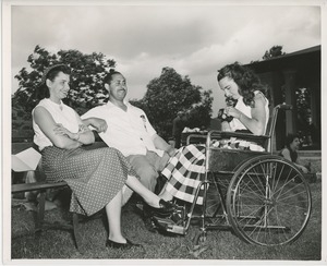 Woman in wheelchair taking picture