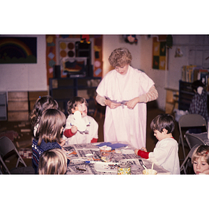 Young children working on art projects