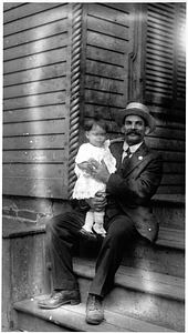 Father and son in the Back Central Street neighborhood. [02]