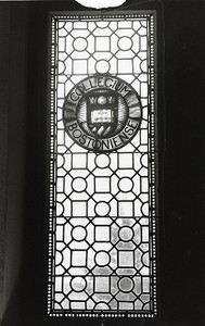 Boston College seal in stained glass at the Burns Library