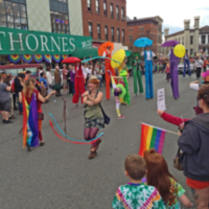 Performers and stilts at Pride 2014