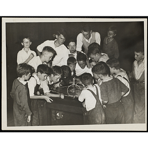 A group of boys play a game in the Charlestown Clubhouse