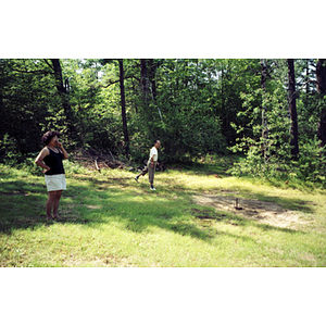 Suzanne Lee and Association member playing horseshoes