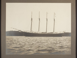 View of four-masted ship at anchor