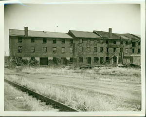 Exterior view of old merchants' warehouses and offices, Ferry Wharf, Newburyport, Mass., undated