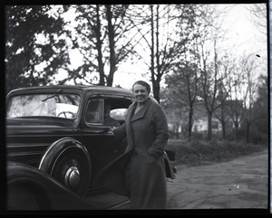 Donald W. Barnes: woman standing by automobile