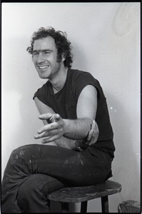 Studio portrait of Richard Safft, seated on a stool