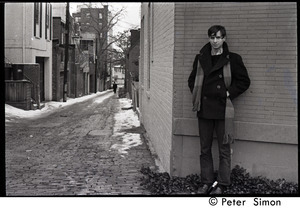 Stephen Davis (BU News) standing by an alley