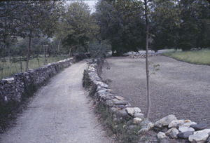 Stone walls alongside road