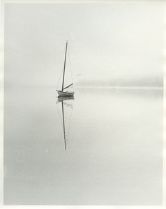 Sailboat on still lake