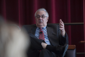 Congressman Barney Frank seated on the Student Union Ballroom stage, UMass Amherst, during his book event