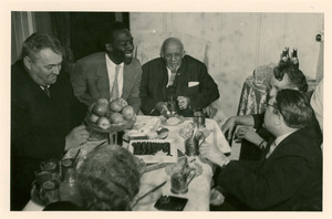 W. E. B. Du Bois and others gathered around table in Soviet Union