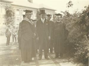 Hugh P. Baker, Joseph B. Ely and Fred J. Sievers during commencement ceremonies