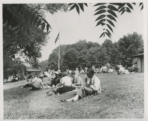 People eating on grass