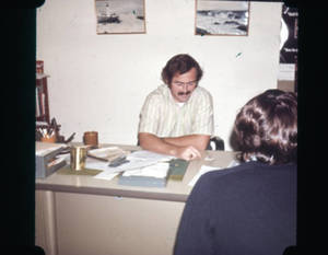 Dick Whiting sitting at desk