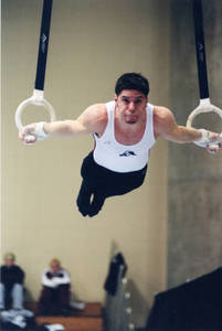 Springfield College male gymnast on rings at USGF Championship (April, 2001)