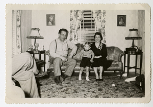 Tebert, Robert, and Deolinda Mello on couch