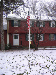 Flag in front of house