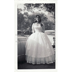 Girl poses in her prom dress