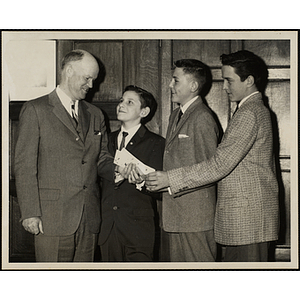 Three boys receiving awards in the Carl Tilden Keller Essay Contest