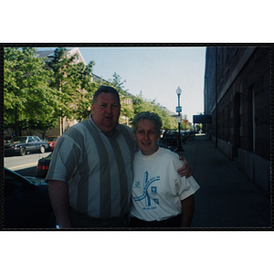 A woman and a man pose for a shot at the Battle of Bunker Hill Road Race