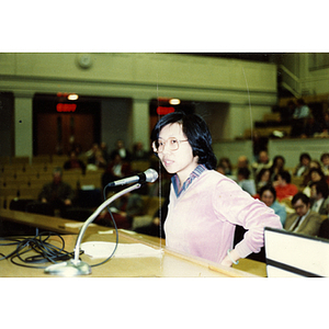 Chinese woman testifies at a public hearing on closing a Massachusetts Bay Transit Authority station