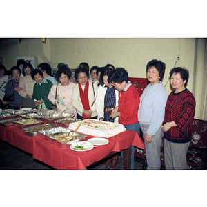 Cake-cutting at an International Women's Day event