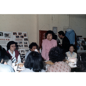 Guests talking at an International Women's Day event