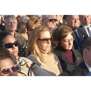 Two women in the audience at the Veterans Memorial dedication ceremony