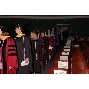 Faculty members proceed into School of Nursing convocation