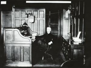 Portrait of Mr. Ferry, seated, facing left, location unknown, 1900s